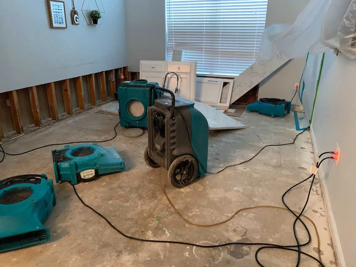 Dehumidifier in flood-cut room for Water Damage Restoration in East Grand Forks